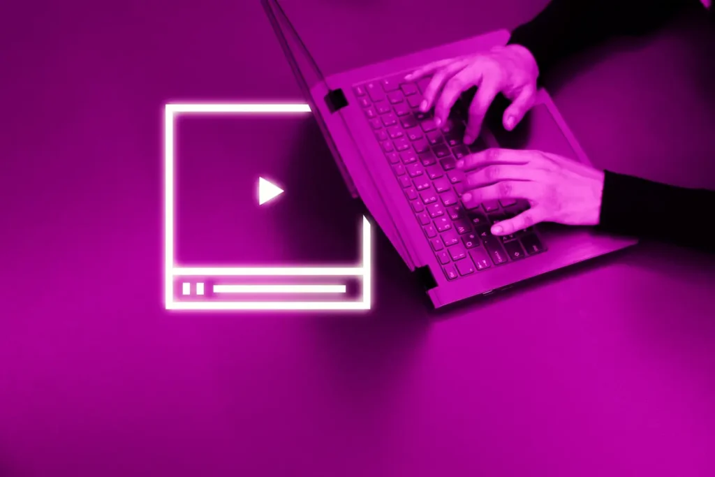laptop i ikona odtwarzania filmu